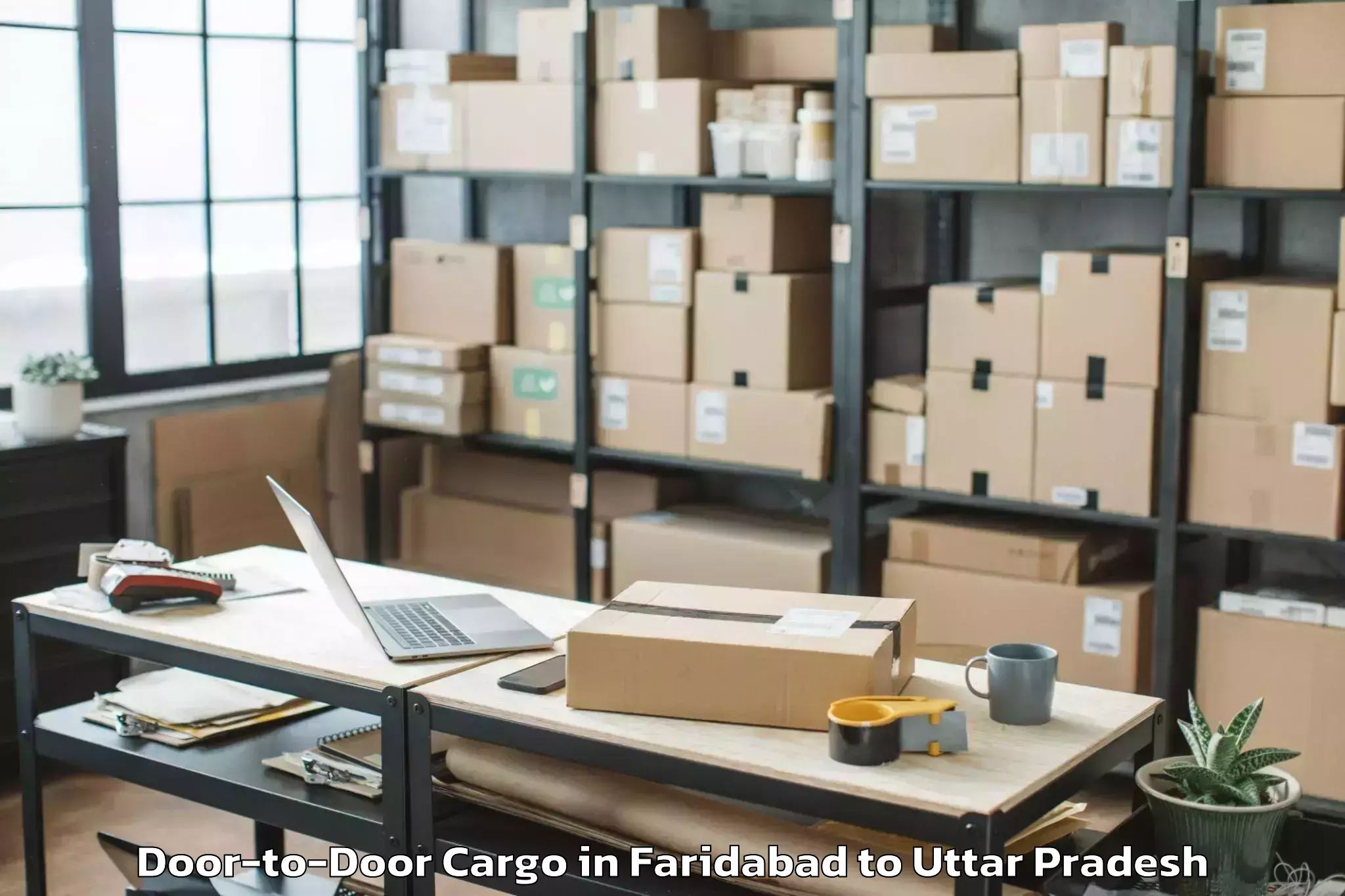 Leading Faridabad to Belthara Road Door To Door Cargo Provider